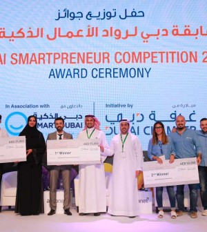 H.E. Dr. Aisha Bin Bishr and Essa Al Zaabi with the winners